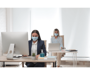 Employees wearing masks while working