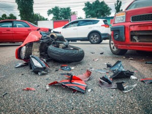 A motorcycle accident crash scene. A Weston motorcycle accident lawyer may be able to help you to maximize compensation for your injuries and other damages.