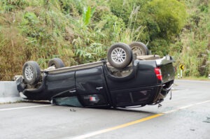 an-overturned-car-caused-by-poor-road-design