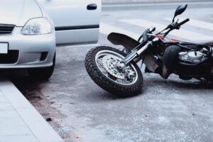 The photo shows a motorcycle accident scene. Contact a Hollywood motorcycle accident lawyer now.